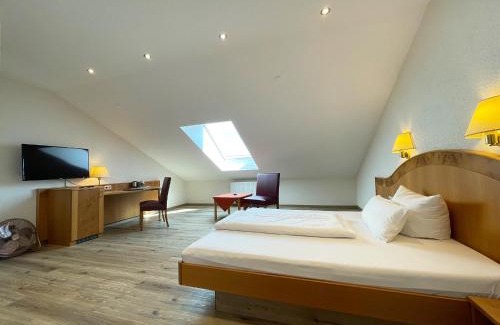 Worms Hotel | Charming Weingut Sandwiese Winzerhotel with Family Amenities
