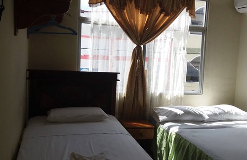 Bahia de la Academia Cabin | Discover Hostal Miconia: Your Ideal Kitchen Retreat