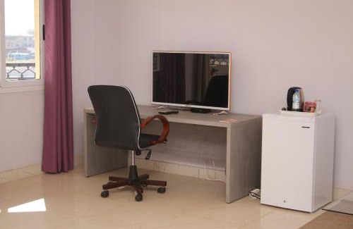 Ouagadougou Hotel | Cozy Welcome Lodge: Family-Friendly with Pool & Breakfast
