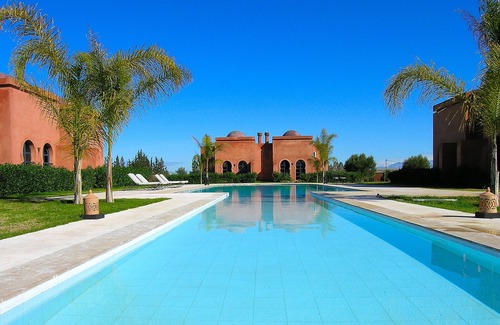 El Aggada Apartment | Explore Marrakech: Relax by the Pool in Paradise