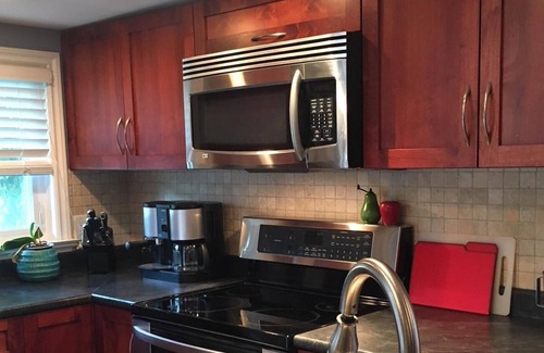 Grand Boulevard House | Inviting 2 Bedroom Basement Suite with Pool & Spa Access