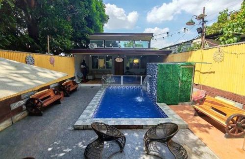 Bacolor Villa | Discover Our Inviting Farm House with Pool and Pet-Friendly Amenities