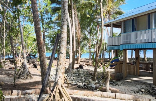 Santa Isabel Island House | Discover Putuo Ecolodge: Oceanfront Retreat in Solomon
