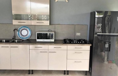Balashi Apartment | Explore Palm House Apartments: Oceanfront Oasis Awaits