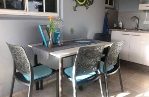 Balashi Apartment | Explore Palm House Apartments: Oceanfront Oasis Awaits