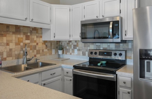 Osage Beach Condo | Discover Paradise: Lakefront Pool & Boat Slip Retreat
