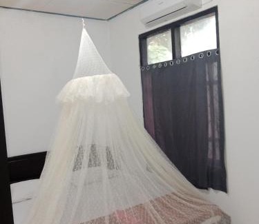 Riung House | Discover Mentos Homestay: Child-Friendly & Breakfast Included