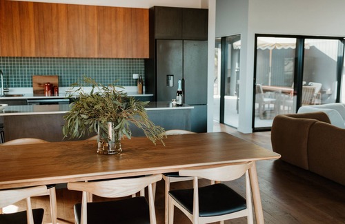 Newland House | Indulge at Salty Brush with Spa and Hot Tub Amenities