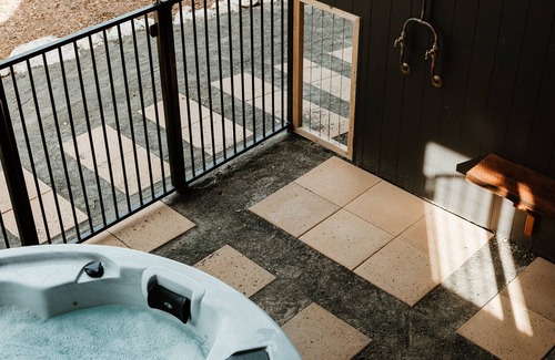 Newland House | Indulge at Salty Brush with Spa and Hot Tub Amenities