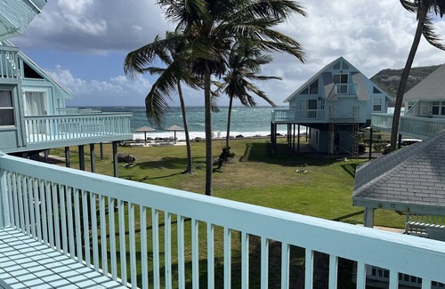 Kittian Village Condo | Experience SeaLofts: Tranquil Beach View & Family Amenities
