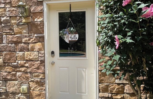 Powder Springs House | Relax in a Well-Appointed Farmhouse Suite with Pool