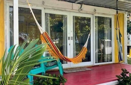 Islote Apartment | Exceptional DK Backyard Yellow Room: Pet & Child Friendly