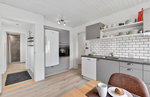 Tim House | Welcome to this attractive vacation home with beautiful outdoor areas.
