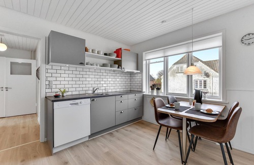 Tim House | Welcome to this attractive vacation home with beautiful outdoor areas.