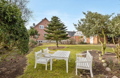 Tim House | Welcome to this attractive vacation home with beautiful outdoor areas.