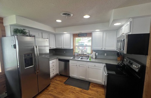 Houghton Lake House | Explore Trail's End Cottage on Houghton Lake - Pet Friendly!