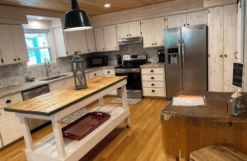 Wimberley House | Top-Rated Creekside Farmhouse on Lone Man Creek for Families
