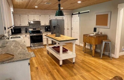 Wimberley House | Top-Rated Creekside Farmhouse on Lone Man Creek for Families