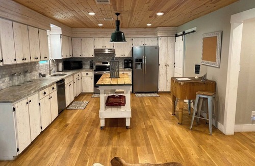 Wimberley House | Top-Rated Creekside Farmhouse on Lone Man Creek for Families