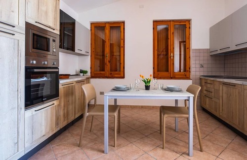 Magomadas Apartment | Welcomely - Badde Nuraghe: Family-Friendly with Breakfast