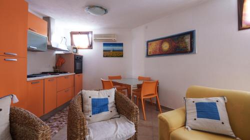 Sanalvo Apartment | Discover Welcomely - Petali di Rosa: Family-Friendly Stay