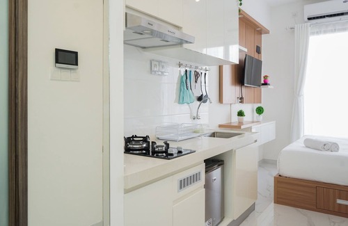 Bumi Serpong Damai Apartment | Cozy Studio at Sky House BSD with Pool & Kitchen Access