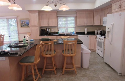 North Beach House | Spacious 4-Bedroom Retreat near North Beach with Hot Tub