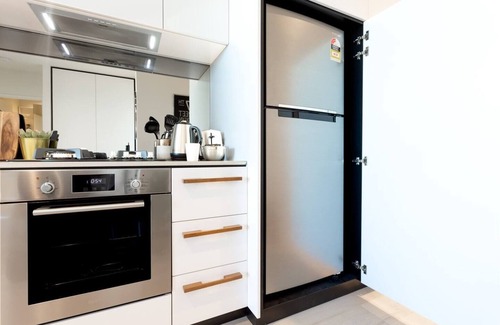 West Melbourne Apartment | Convenient North Melbourne Escape with Balcony & Family-Friendly Amenities