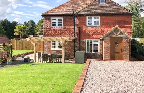 Barns Green House | Inviting Well Cottage: Pet & Child Friendly Retreat
