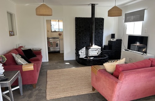 Te Akau House | West Coast Retreat - Pet-Friendly Getaway with River Views