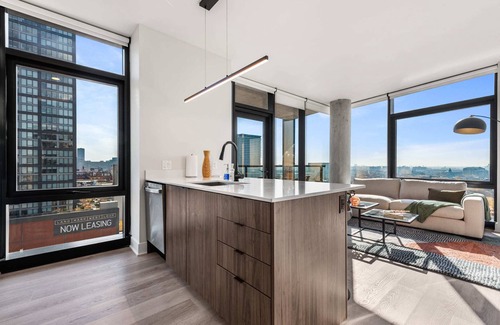 West Loop Apartment | Elevate Your Stay at Cloud9: Co-Working & Gym Access