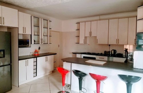 Mount Hampden Apartment | Discover WestPoint Quays: Family-Friendly with Pool Access