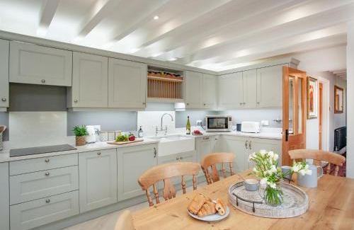 Branscombe House | Enchanting Wheelwright Cottage: Pet & Child Friendly Getaway