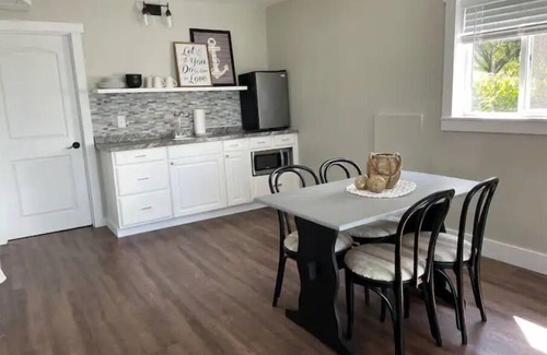 Gladwin House | Relax at Whispering Pines Lake House with Ocean Views