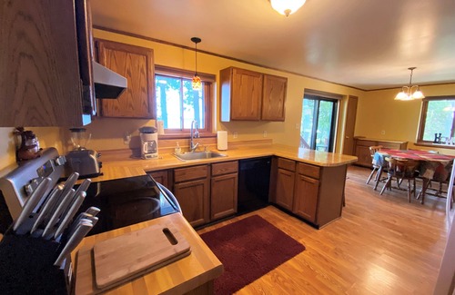 Moran House | Relax at Whispering Shores on Brevort Lake with Scenic Views