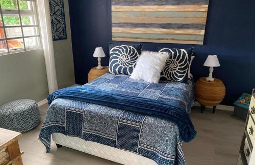 Kouga House | Ocean View Retreat at Whispering Waves - Rated 9/10 by Guests