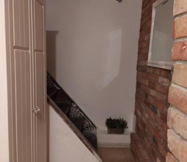 Elblag Apartment | Family-Friendly White Apartment with Hot Tub & Great Reviews