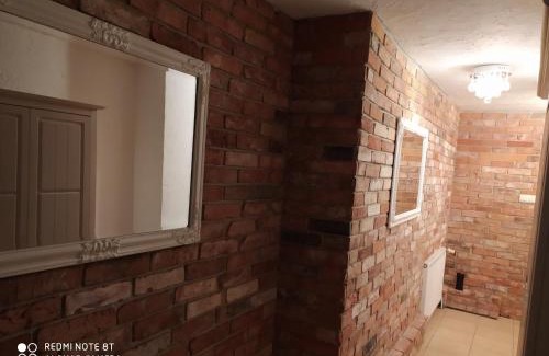 Elblag Apartment | Family-Friendly White Apartment with Hot Tub & Great Reviews