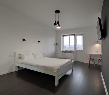 Sukhinovka Apartment | Budget-Friendly White Apartment with Family Amenities