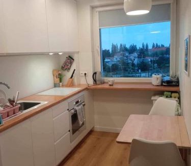 Emaus Apartment | White Cloud Apartment