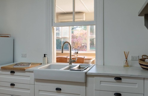 Rylstone House | Discover White Corner Cottage: Heritage Home with Top Amenities