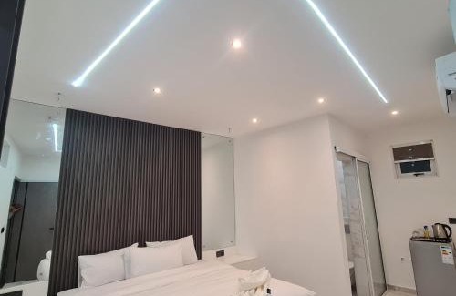 Central B Hotel | Budget-Friendly White Garden Hotel with Complimentary Breakfast