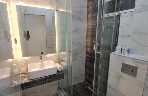 Central B Hotel | Budget-Friendly White Garden Hotel with Complimentary Breakfast