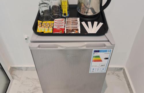 Central B Hotel | Budget-Friendly White Garden Hotel with Complimentary Breakfast