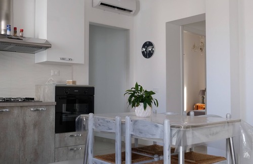 Trapani Apartment | Top-rated White Gold Apartments with Cozy Kitchen Amenities