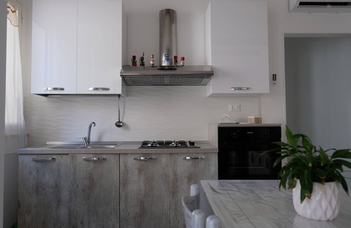 Trapani Apartment | Top-rated White Gold Apartments with Cozy Kitchen Amenities