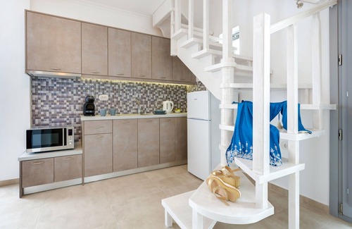 Megalochori Apartment | Top-Rated White Harmony Suites with Family-Friendly Amenities