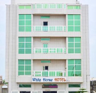 Agblangandan Hotel | Welcoming White Horse Hotel in Cotonou with Ocean Views
