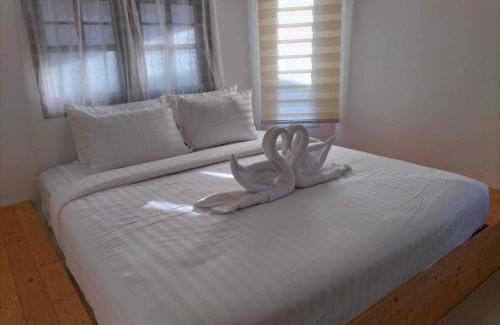 Bai Lan Hotel | Oceanfront White House Bailan Resort with Pool & Beach Access