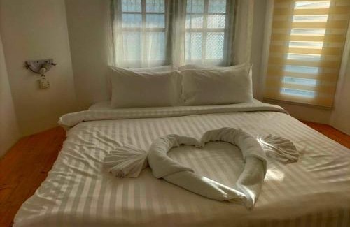 Bai Lan Hotel | Oceanfront White House Bailan Resort with Pool & Beach Access